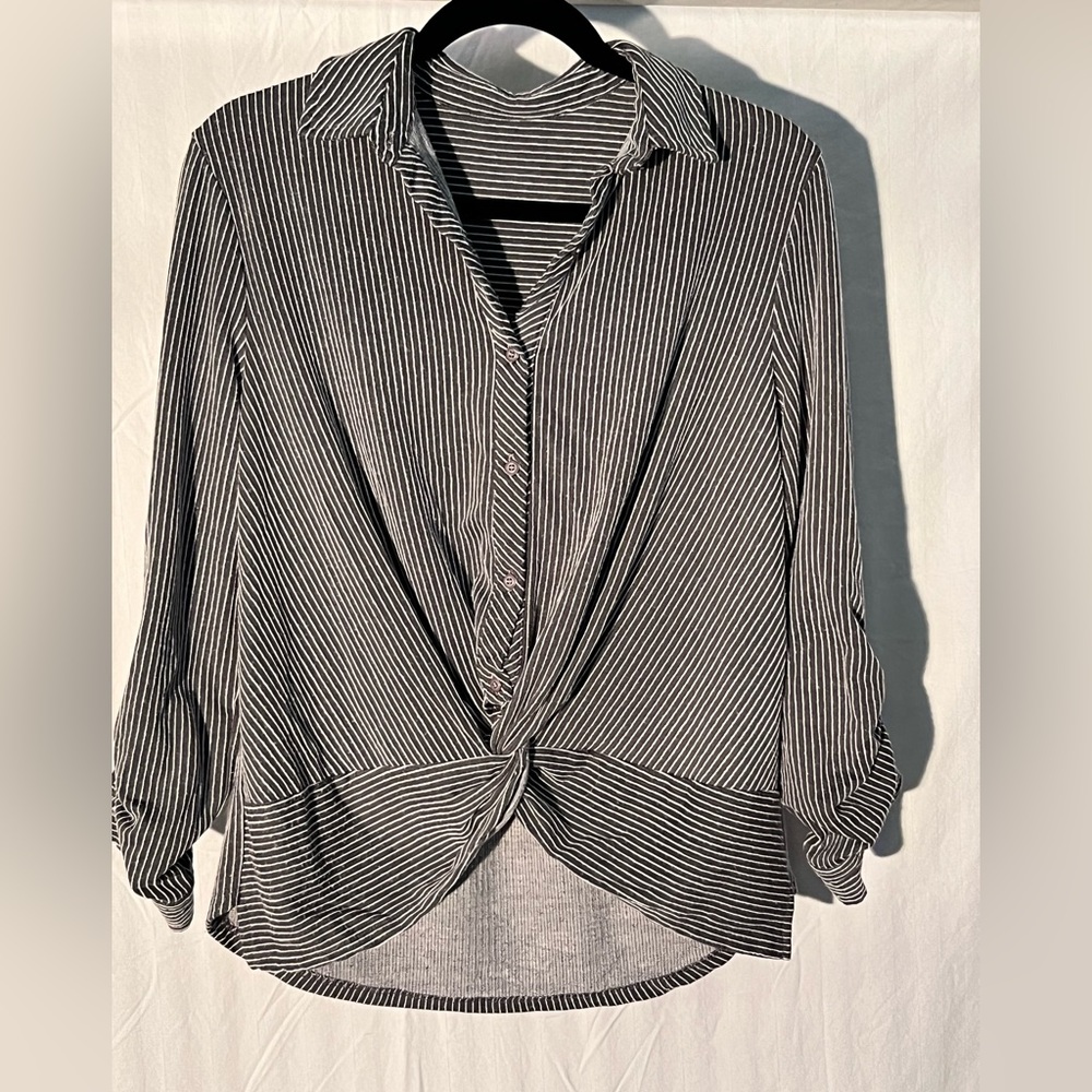 Size S button down with front knot twist.  Blue and cream stripe.  Knit